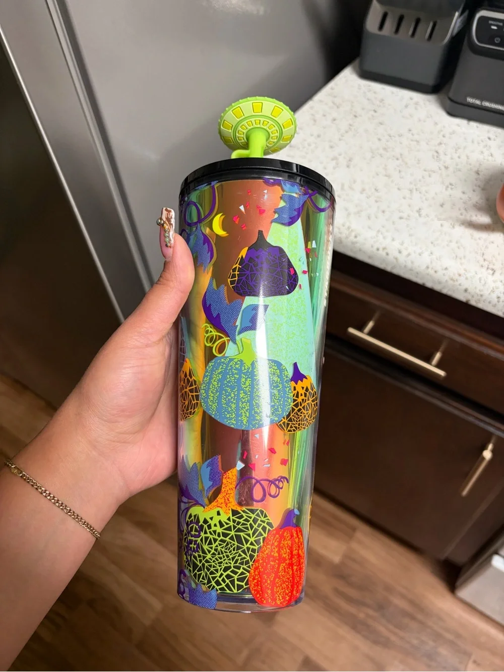 Starbucks Iridescent Tumbler with Neon Green Lid and Multi-Color Fruit Motifs
